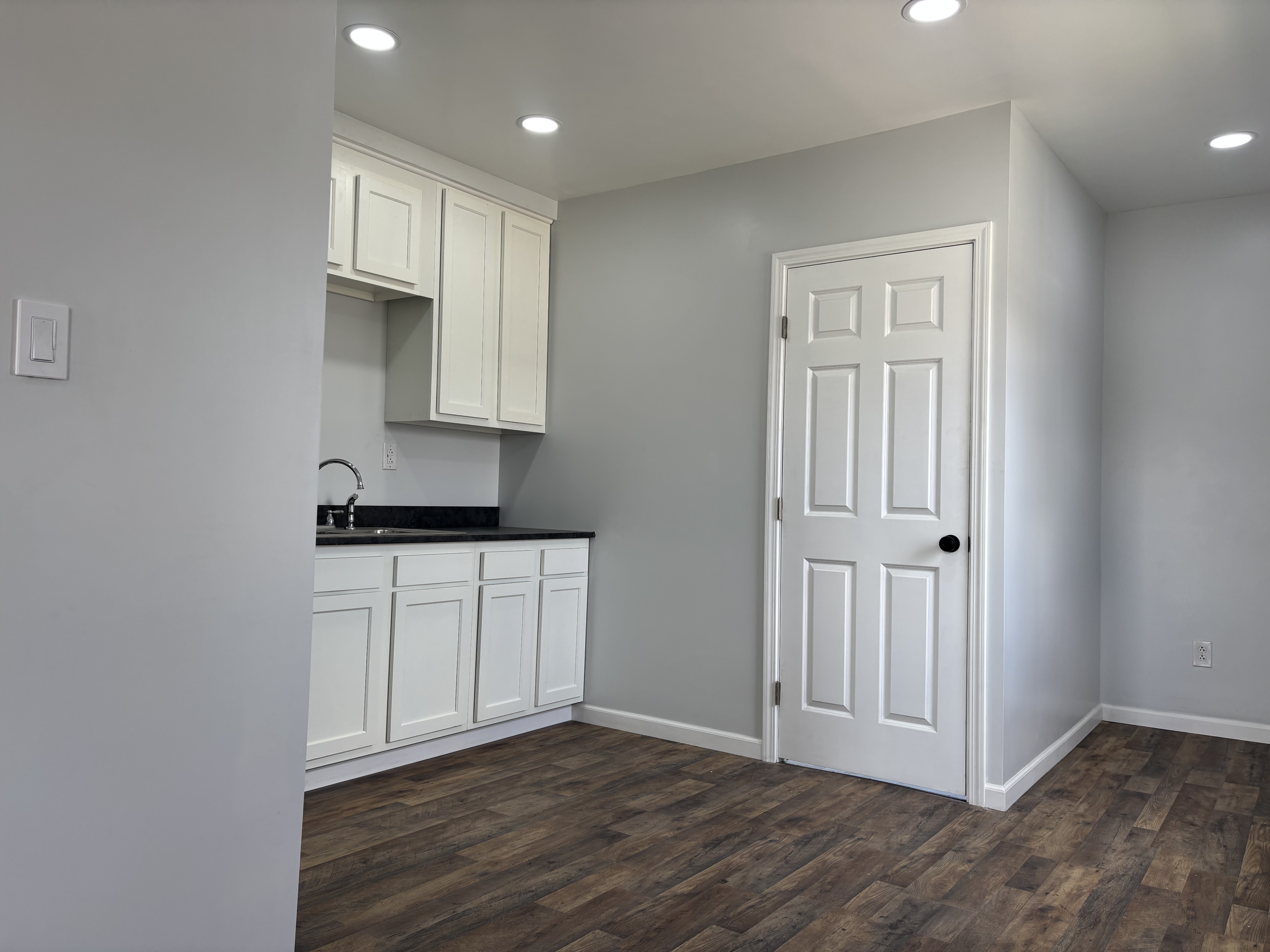 Kitchen with white cabinetry